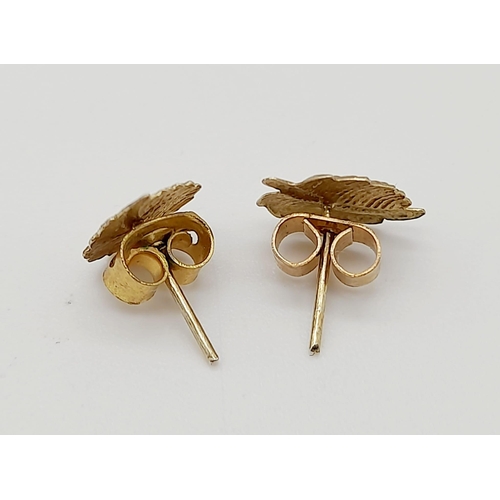 1133 - A Pair of 9K Yellow Gold Leaf Design Earrings.