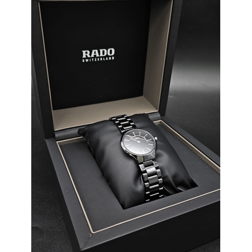 205 - A Rado True Thinline Black Steel and Ceramic Ladies Watch. Case - 30mm. Black dial. Quartz movement.... 