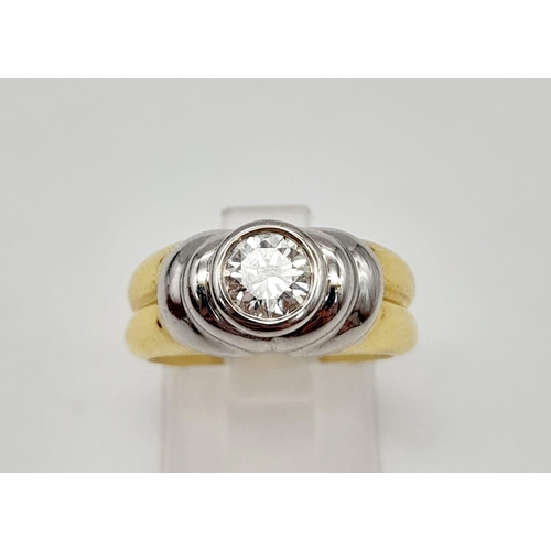 296 - A High-Karat Yellow and White Gold (tested) Diamond Solitaire Ring. 0.75ct. VS2. 8.65g total weight.... 