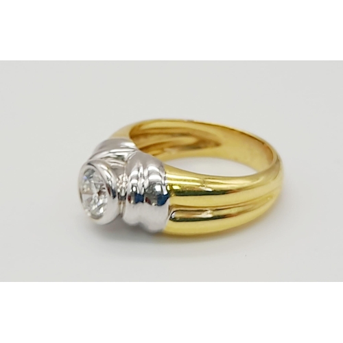 296 - A High-Karat Yellow and White Gold (tested) Diamond Solitaire Ring. 0.75ct. VS2. 8.65g total weight.... 