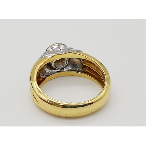 296 - A High-Karat Yellow and White Gold (tested) Diamond Solitaire Ring. 0.75ct. VS2. 8.65g total weight.... 