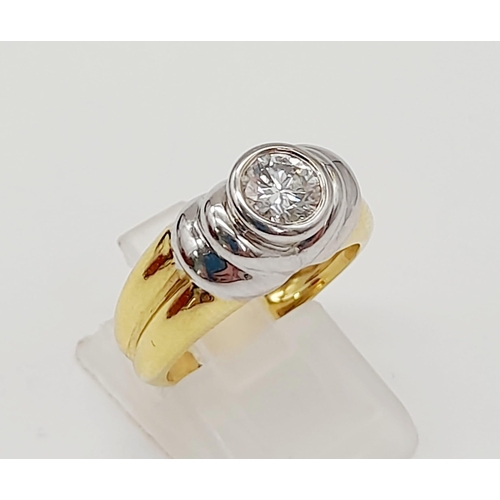 296 - A High-Karat Yellow and White Gold (tested) Diamond Solitaire Ring. 0.75ct. VS2. 8.65g total weight.... 