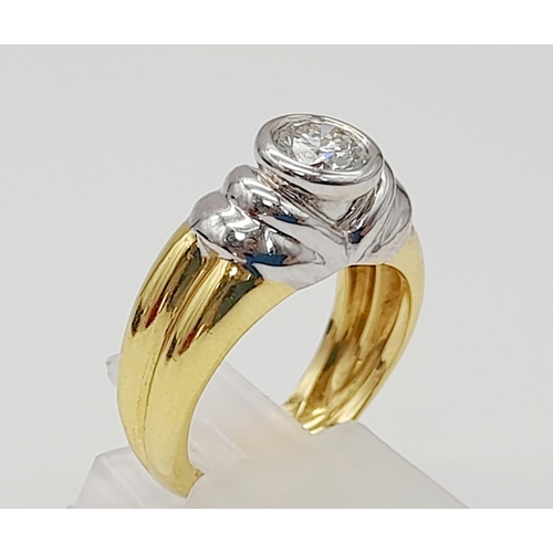 296 - A High-Karat Yellow and White Gold (tested) Diamond Solitaire Ring. 0.75ct. VS2. 8.65g total weight.... 