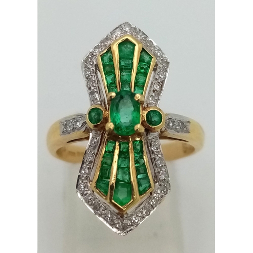 324 - An Exquisite 18K Yellow Gold, Emerald and Diamond Ring. A cluster of round-cut diamonds surround a m... 