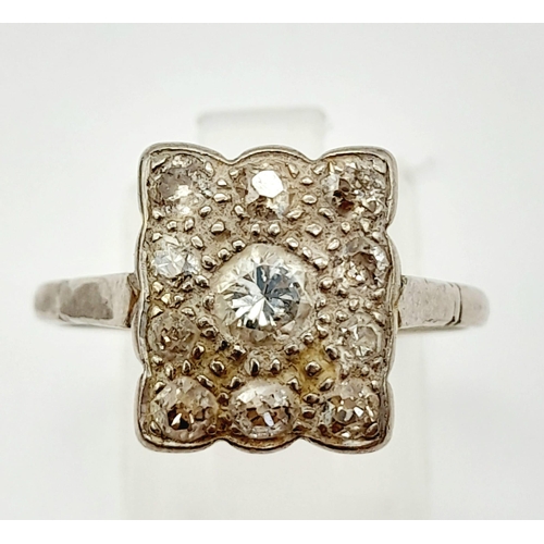 409 - A Vintage 10K White Gold and Diamond Ring. Size T. 4.06g total weight. Ref: 012188