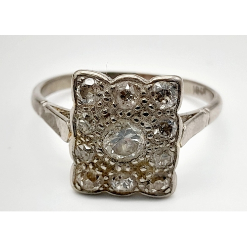 409 - A Vintage 10K White Gold and Diamond Ring. Size T. 4.06g total weight. Ref: 012188