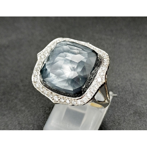 54 - A Stephen Webster (designer) 18K White Gold, Diamond and Blue Haze Crystal Ring. Size M 1/2. 13.8g t... 