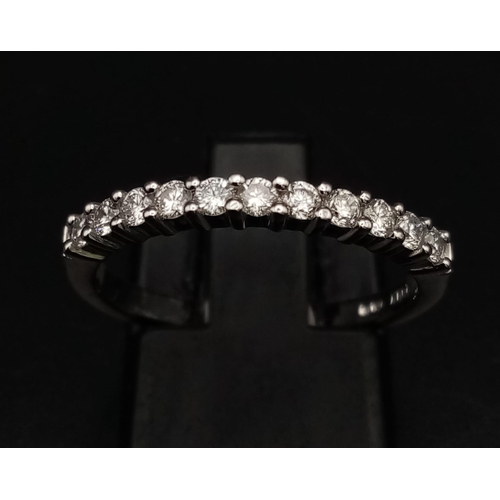 640 - An 18K White Gold Half Eternity Diamond Ring. 0.33ct. Size N. 2.89g total weight. Ref: 007576