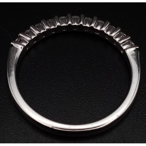 640 - An 18K White Gold Half Eternity Diamond Ring. 0.33ct. Size N. 2.89g total weight. Ref: 007576