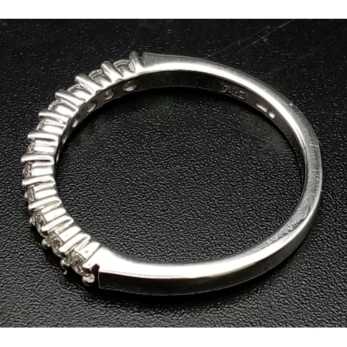 640 - An 18K White Gold Half Eternity Diamond Ring. 0.33ct. Size N. 2.89g total weight. Ref: 007576