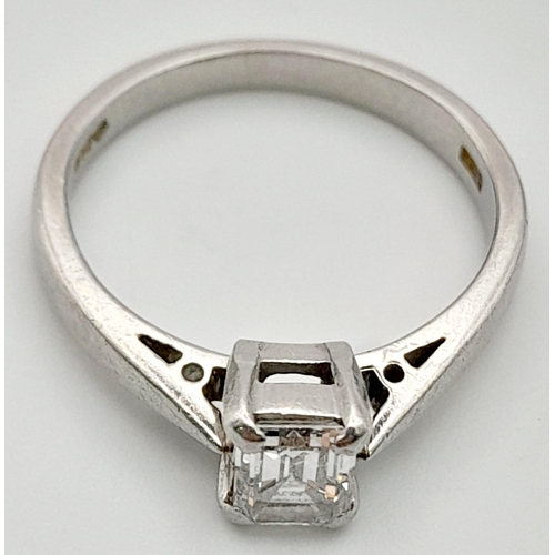 687 - A Platinum Diamond Solitaire Ring. A Rectangular-cut (0.5ct approx) diamond. Size J. 3.72g total wei... 