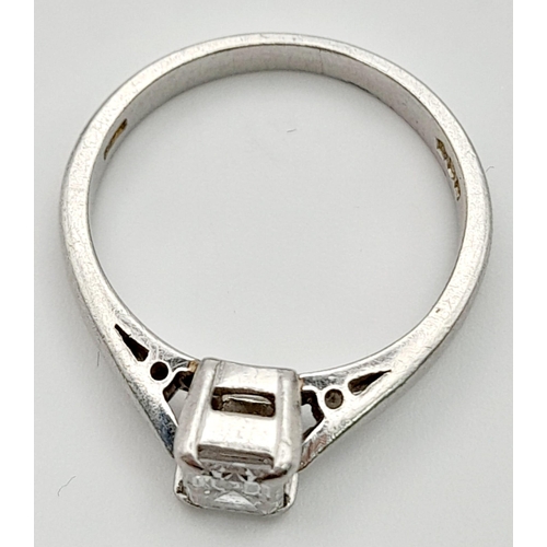 687 - A Platinum Diamond Solitaire Ring. A Rectangular-cut (0.5ct approx) diamond. Size J. 3.72g total wei... 