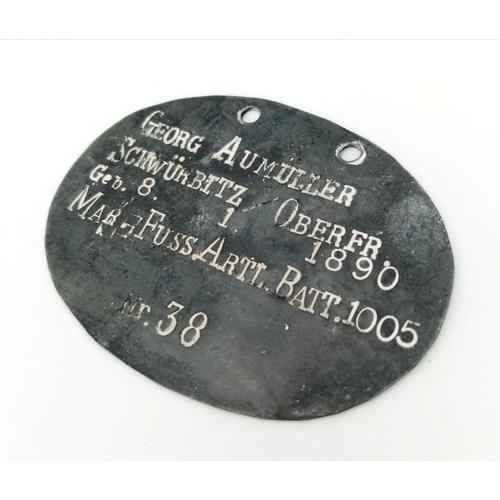 432 - WW1 Imperial German Dog Tag to a Corporal in the Foot Artillery Battalion.