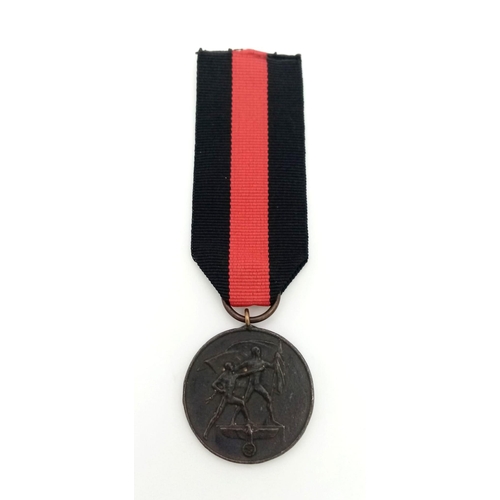 1023 - 3rd Reich Sudetenland Medal for entry into Poland.