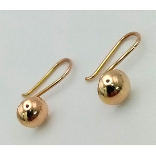 128 - 14k yellow gold drop earrings with ball, 1.3g