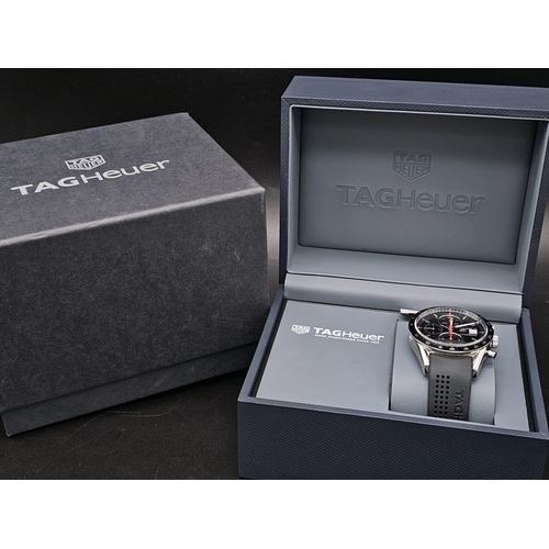 110 - A Tag Heuer Carrera Chronograph Gents Watch. Black rubber strap. Stainless steel case - 42mm. Black ... 