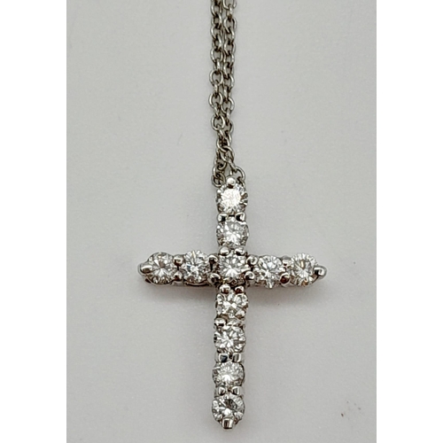 149 - A Tiffany and Co. Platinum (950) Necklace with Platinum and Diamond Cross Pendant. 2cm and 40cm. 3.8... 