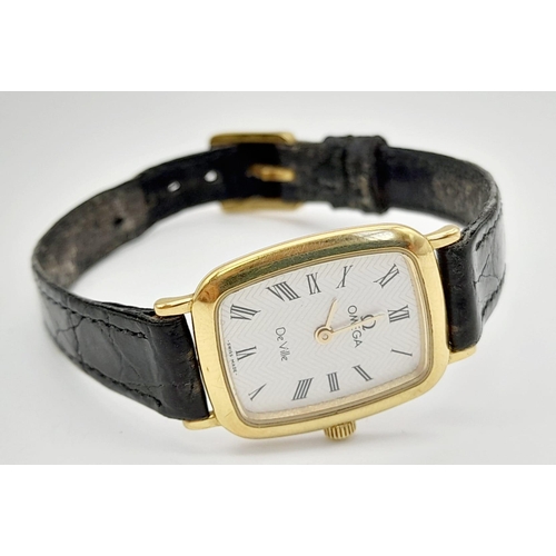 281 - A Vintage Omega Deville Quartz Ladies Watch. Black leather strap. Two tone case - 18mm. Needs a batt... 