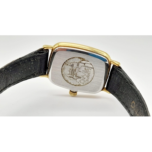 281 - A Vintage Omega Deville Quartz Ladies Watch. Black leather strap. Two tone case - 18mm. Needs a batt... 