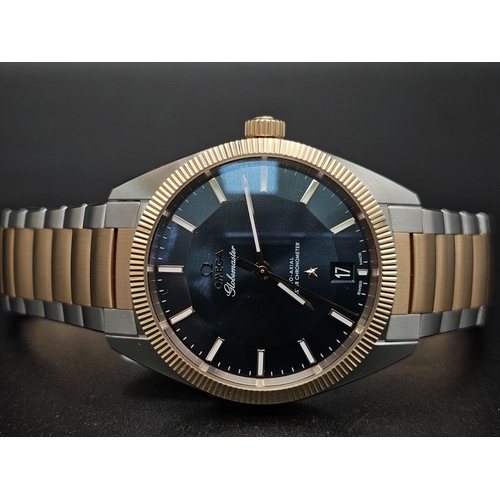 303 - An Omega Globemaster Constellation Gents Watch. Bi-metal (gold and steel) strap and case - 39mm. Blu... 