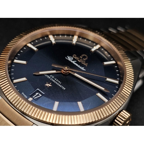 303 - An Omega Globemaster Constellation Gents Watch. Bi-metal (gold and steel) strap and case - 39mm. Blu... 