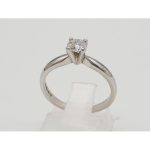 387 - A 950 Platinum Diamond Solitaire Ring. Crystal-clear 0.2ct round cut diamond. Size L. 3.7g total wei... 