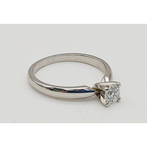 387 - A 950 Platinum Diamond Solitaire Ring. Crystal-clear 0.2ct round cut diamond. Size L. 3.7g total wei... 