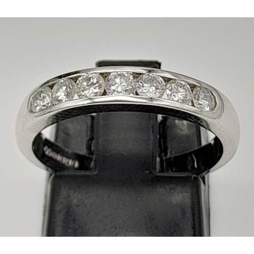 423 - An 18K White Gold Diamond Half-Eternity Ring. 0.42ct of round-cut diamonds. Size M. 3.67g total weig... 