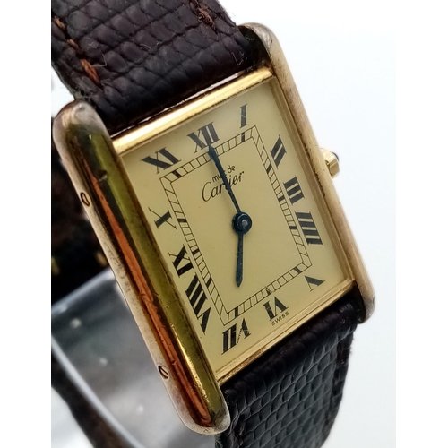 499 - A Vintage Cartier Quartz Tank 925 Silver Vermeil Watch. Brown leather strap. Case - 24mm. In working... 