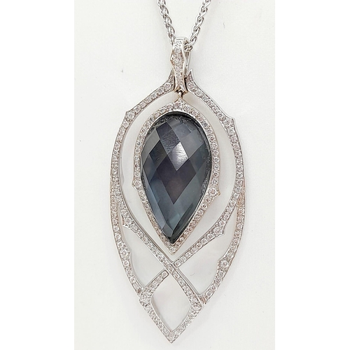 6 - A Stephen Webster (designer) 18K White Gold, Diamond and Blue Crystal Haze Drop Pendant. A wonderful... 