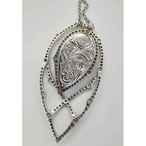 6 - A Stephen Webster (designer) 18K White Gold, Diamond and Blue Crystal Haze Drop Pendant. A wonderful... 