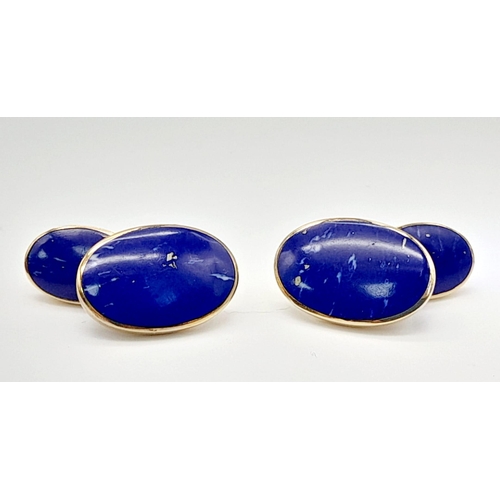 618 - A Pair of 9K Yellow Gold and Lapis Lazulli Cufflinks. Quality oval lapis cabochons create a classic ... 