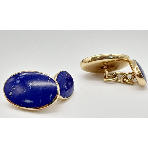 618 - A Pair of 9K Yellow Gold and Lapis Lazulli Cufflinks. Quality oval lapis cabochons create a classic ... 