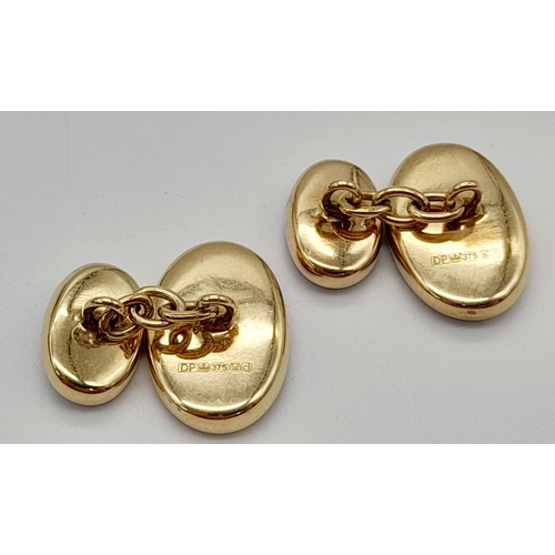 618 - A Pair of 9K Yellow Gold and Lapis Lazulli Cufflinks. Quality oval lapis cabochons create a classic ... 