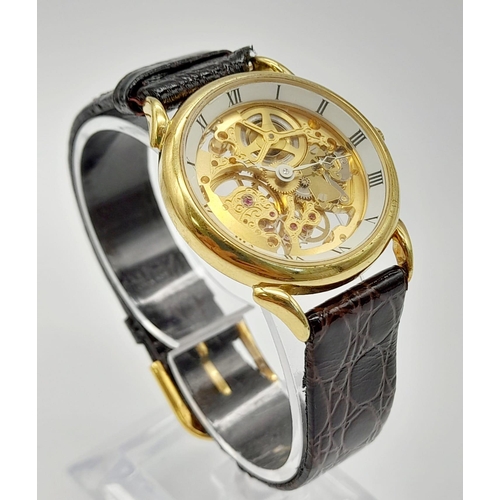 694 - A Benrus 17 Jewel Skeleton Gents Watch. Brown leather strap. Skeleton case - 31mm. Automatic movemen... 