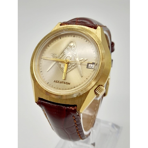 722 - A Bulova Accutron Quartz Gents Watch. Burgundy leather strap. Two tone case - 37mm. Gold tone dial w... 