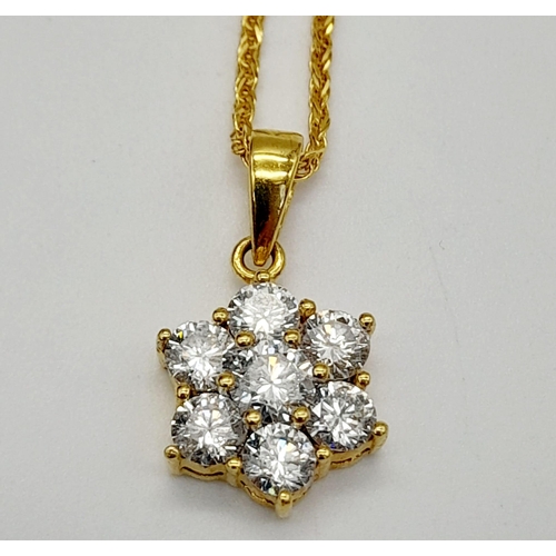 75 - An 18K Yellow Gold Floral Decorative Diamond Jewellery Set.
A necklace with pendant, ring and a pair... 