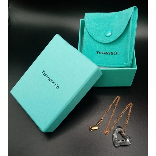 103 - A Tiffany and Co. 18K Gold Necklace with a Tiffany Open Heart Crystal Pendant. 2.5cm and 42cm. 4.4g ... 