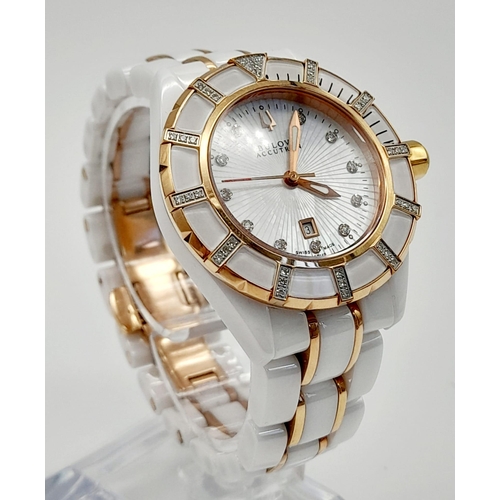 331 - A Bulova Accutron Ladies Quartz Watch. White ceramic and gilded steel strap and case - 36mm. Mother ... 