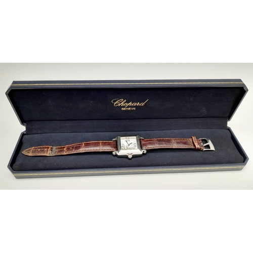 430 - A Chopard Happy Sport Floating Diamond Watch. Original brown leather strap. Steel case - 27mm. White... 