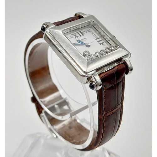 430 - A Chopard Happy Sport Floating Diamond Watch. Original brown leather strap. Steel case - 27mm. White... 