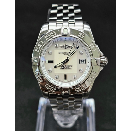 61 - A Breitling Galactic Automatic Ladies Watch. Stainless steel strap and case - 31mm. Cream dial with ... 