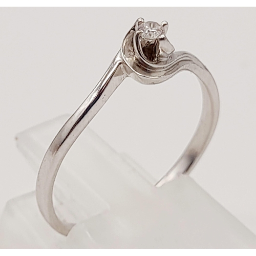 867 - 9K White Gold Diamond Solitaire Ring. Total Weight 1.38grams, Sze L.