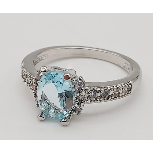 881 - 925 Silver Aquamarine Ring. Total Weight 2.63grams. Size N.