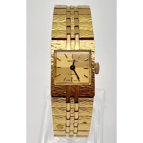 991 - A Ladies Sekonda Gold Tone Bracelet Watch, Stainless steel, Quartz Movement, 18mm Diameter. needs ne... 