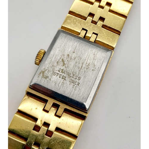 991 - A Ladies Sekonda Gold Tone Bracelet Watch, Stainless steel, Quartz Movement, 18mm Diameter. needs ne... 