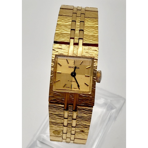 991 - A Ladies Sekonda Gold Tone Bracelet Watch, Stainless steel, Quartz Movement, 18mm Diameter. needs ne... 