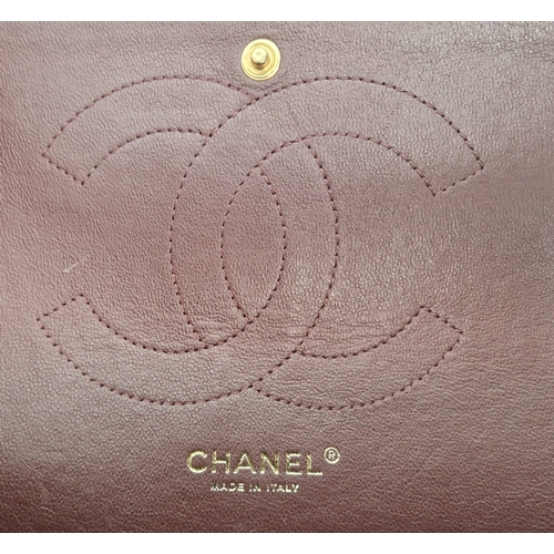 A Classic Chanel Jumbo Flap Bag. Quilted caviar black calfskin. Double ...