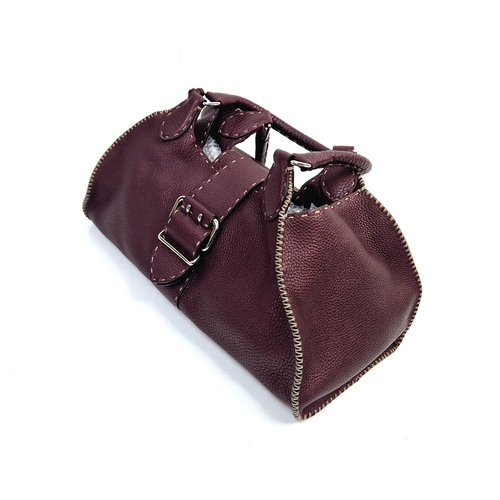 163 - A Fendi Purple Leather Handbag with Dust Cover. Silver tone hardware. Interior zipped compartment. 3... 