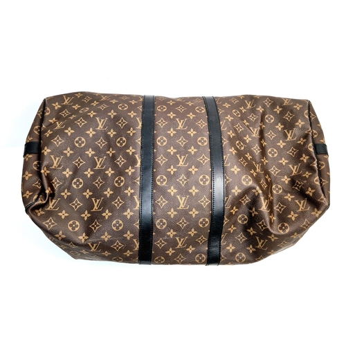 184 - A Louis Vuitton Keepall Hand-Luggage Bag. Brown monogram canvas with black leather handles and trim.... 